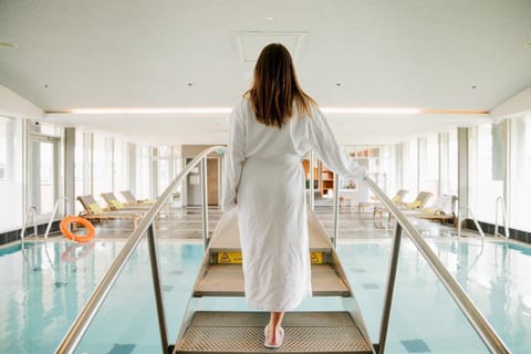 Indoor pool, open 7:00 AM to 10:00 PM, sun loungers