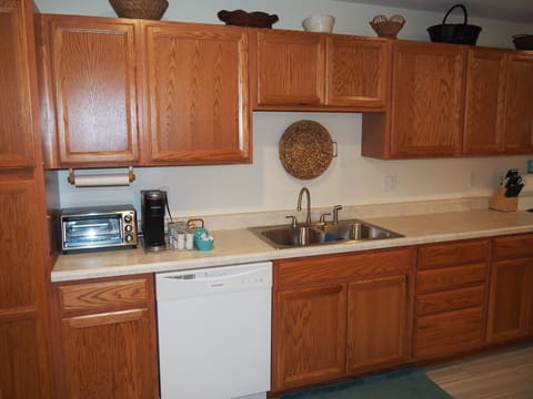 KITCHEN:  Very convenient and modern kitchen with all appliances including a dishwasher, microwave, toaster oven, and Keurig coffee maker.