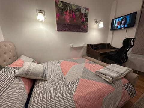 Bedroom with double bed for up to 2 people.
