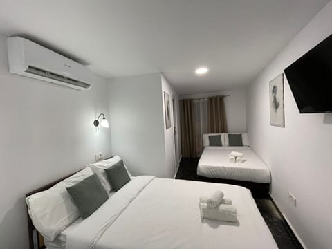 Standard Twin Room, 2 Twin Beds, Balcony, City View | Free WiFi, bed sheets