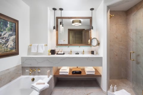 Designer toiletries, hair dryer, bathrobes, slippers