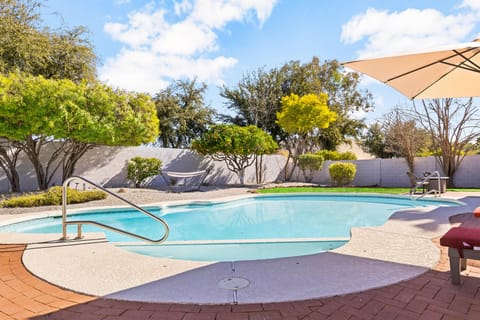 Huge pool and yard area with a deck and sunloungers for everyone to enjoy