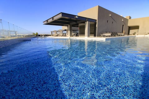 3 outdoor pools, open 9:00 AM to 10:00 PM, sun loungers