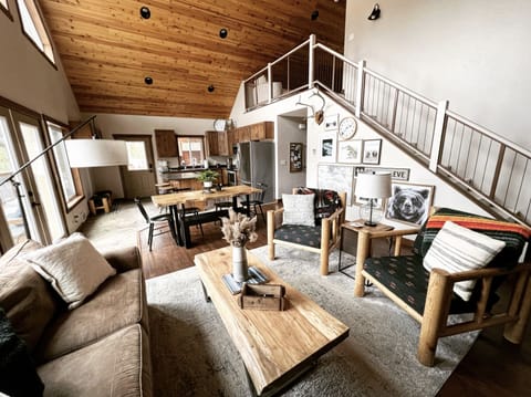 Open living, dining, and kitchen area 