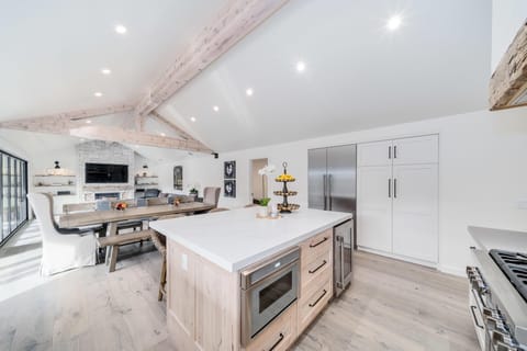 Spacious kitchen with vaulted ceilings and modern amenities