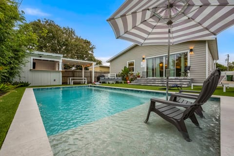 Lounge by the pool or sip a drink at the bar