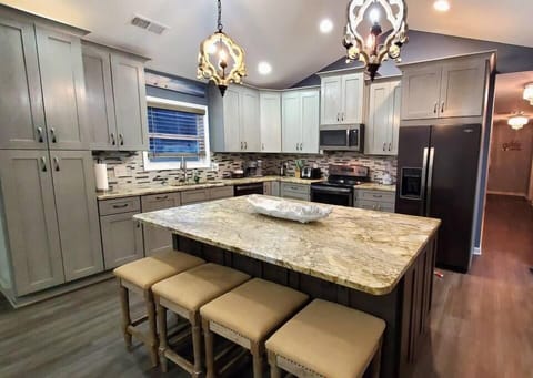 The large open-plan kitchen with modern appliances is a cook’s dream