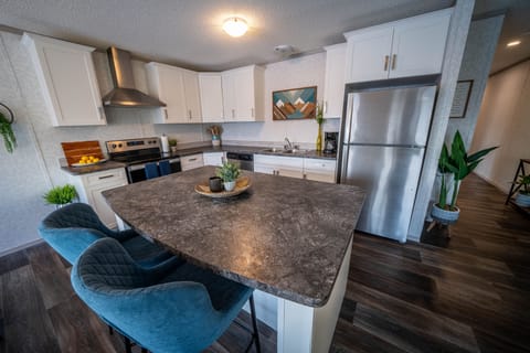 Enjoy a large, spacious, fully equipped  kitchen for meals w/ family & friends
