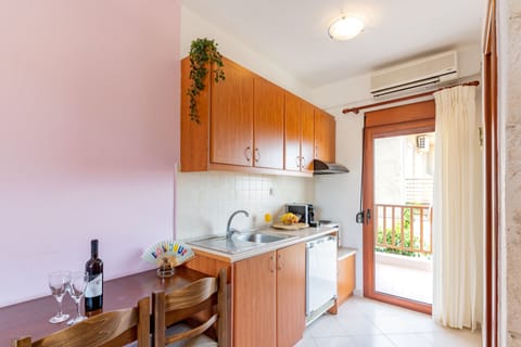 Suite, 2 Bedrooms (for 6) | Private kitchen | Fridge, microwave, stovetop, coffee/tea maker