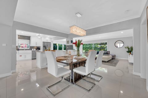 Dining table for 6 plus 6 countertop chairs.