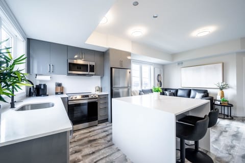 The waterfall island seats 4 people comfortably.