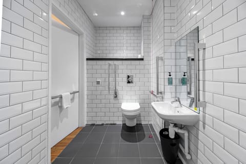 Accessible Double Room without Window | Bathroom | Shower, eco-friendly toiletries, towels, soap