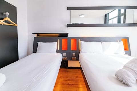 Family Triple Room with window | Premium bedding, in-room safe, soundproofing, iron/ironing board