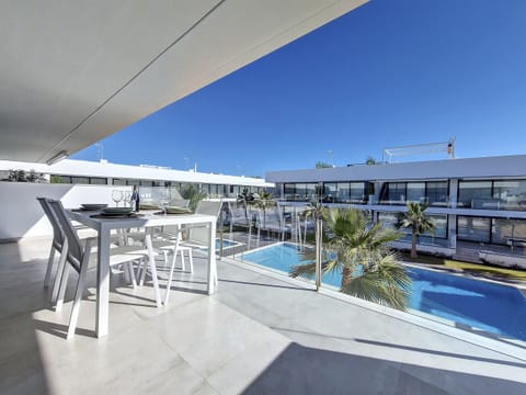 Modern Penthouse apartment with communal pool, Wi-Fi, Smart TV, modern kitchen, stylish open-plan lounge/dining and roof terrace with views.