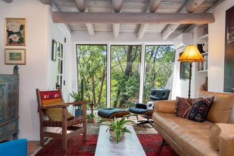 A living room with a couch and a coffee table.