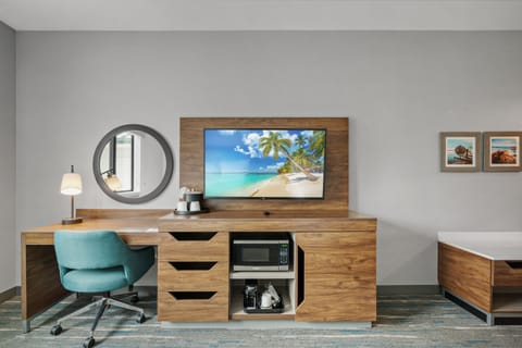 Desk, laptop workspace, blackout drapes, iron/ironing board