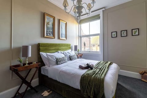 Master bedroom. Soft muted relaxing colours with high quality bedding and blackout blinds.