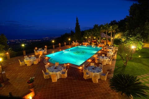 Indoor pool, outdoor pool, pool umbrellas