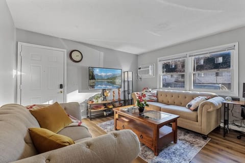 Living View 1 - large space for lounging, playing board games and watching your favorite shows. Features 60` Smart HDTV where you can log in to your favorite apps like Netflix, Hulu, Max, etc.