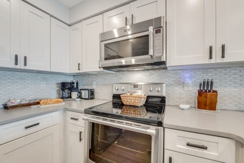 Dual Keurig coffee maker with pods,  basic spices, paper goods and condiments