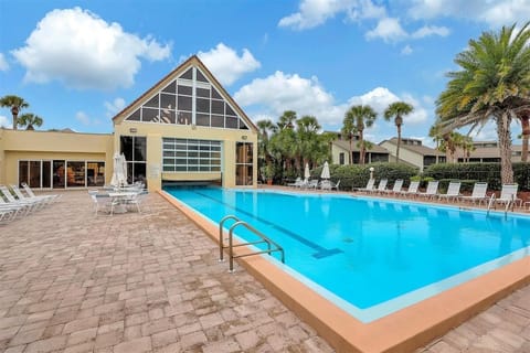 Clubhouse indoor/outdoor, heated pool: 1 minute walk from the back lanai!