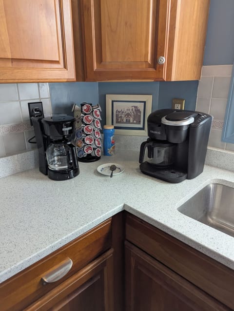 A Keurig & pods as well as a traditional coffee maker & coffee are provided 