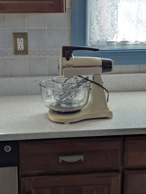  A vintage Sunbeam stand up mixer is provided for our baking guests