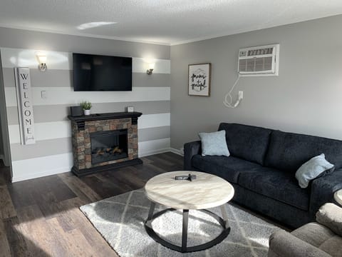 Snuggle up by the electric fireplace on a cold day.