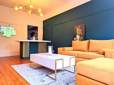 Locally made brand new sofa &  coffee table & kitchen island in a light lounge