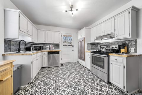 We have 100 year old backsplash and cabinet door to match the age of the house.