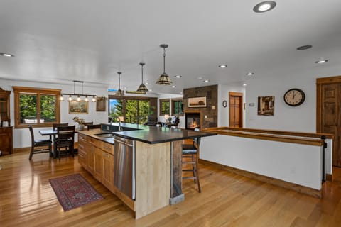 Access the lower level via the stairs in the kitchen.