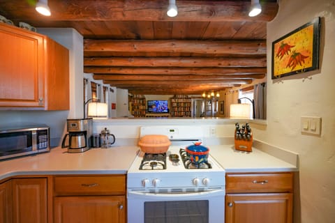 A white stove in a kitchen.