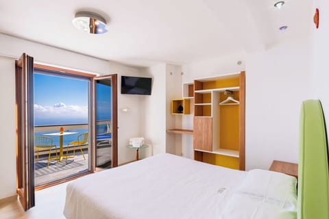 Quadruple Room | Down comforters, minibar, in-room safe, desk