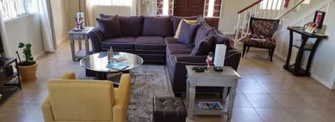 Relax in this big, bright, tastefully designed living room.  TV, Music, Read...