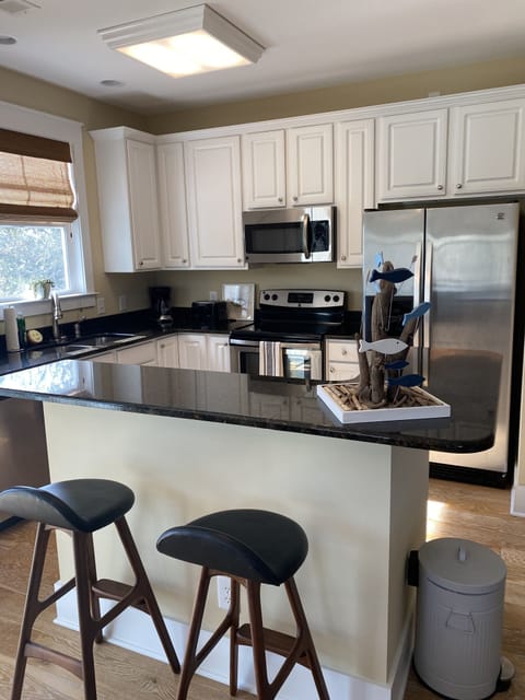 Fully-stocked updated kitchen.