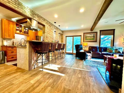 This stunning and spacious living room welcomes you as you enter Be Still and Know. Welcome Home!!