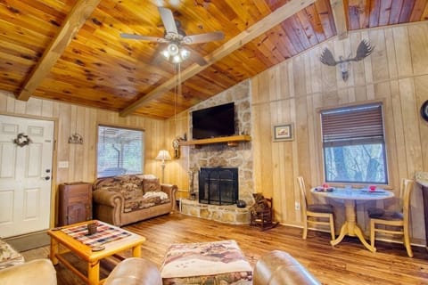 Living room features wood burning fireplace