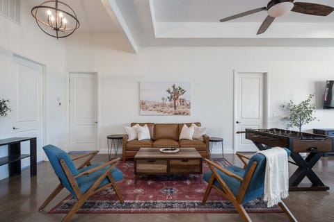 Step into this stylish living room, where modern design meets functionality.