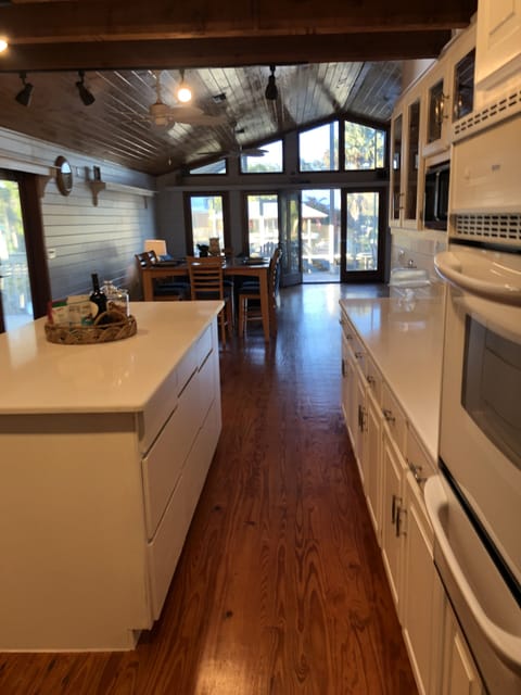 Floor to ceiling windows across the rear let you enjoy the waterfront view 