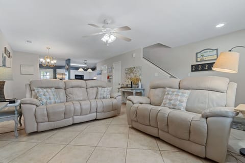Cozy living room with plush seating, perfect for relaxing evenings.