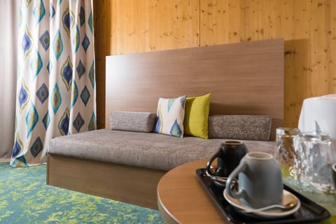 Superior Double Room, 1 King Bed | Living area | 32-inch Smart TV with digital channels, TV