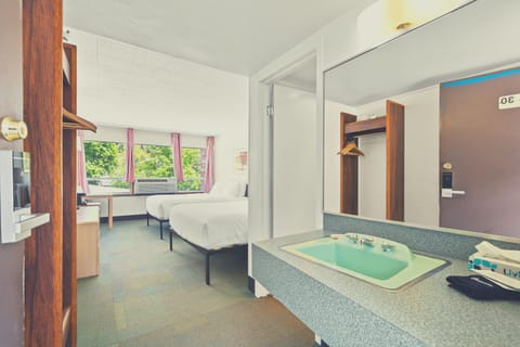 Signature Room, 2 Queen Beds, Non Smoking, 2nd Floor | Hypo-allergenic bedding, down comforters, desk, laptop workspace