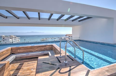 Rooftop pool area with panoramic views of the entire bay!
