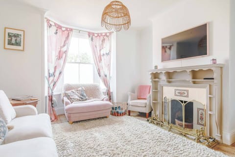 Living room with open fireplace