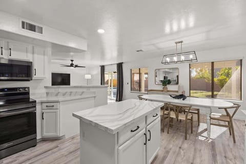 Very light and airy, open kitchen and island.