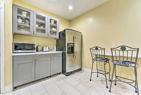 Full kitchen view with modern appliances and breakfast nook