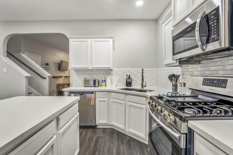 Step into a stylish kitchen with sleek finishes and premium appliances.