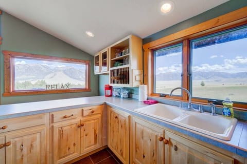 The well stocked kitchen and gas BBQ on the grill deck allow for easy meal prep!