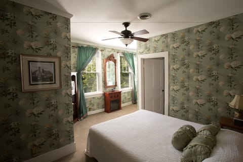 Deluxe Room Queen Bed Fireplace & Private Shower  | Iron/ironing board, free WiFi, bed sheets
