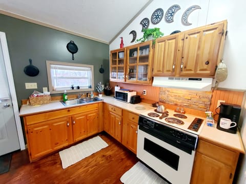 Kitchen offers a Keurig, waffle maker and all you need to make coffee & waffles.